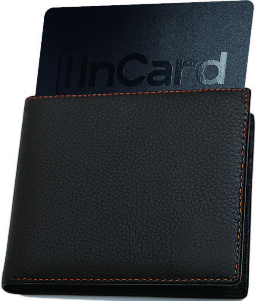 InCard Finder card sitting in an open slim bifold wallet, card flush with credit cards, no bulge visible from the side